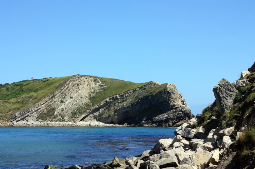 Layers of rock laid down overcountless  millenia at Lulworth cove