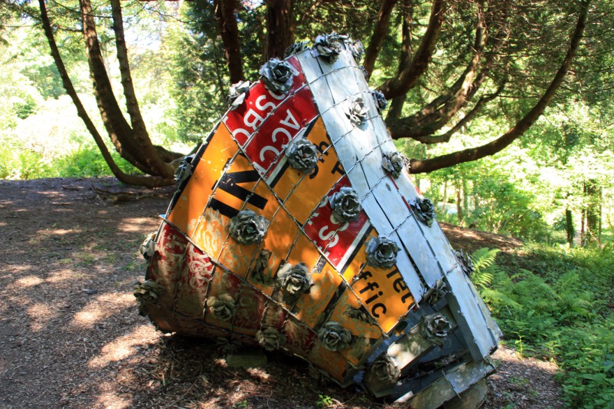 From th other side you can see it's made from road signs and other reclaimed metal.